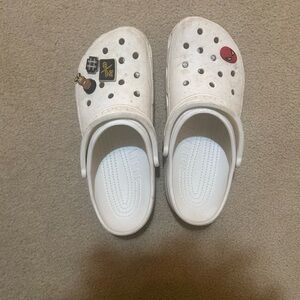 Men’s white crocs with jibbits